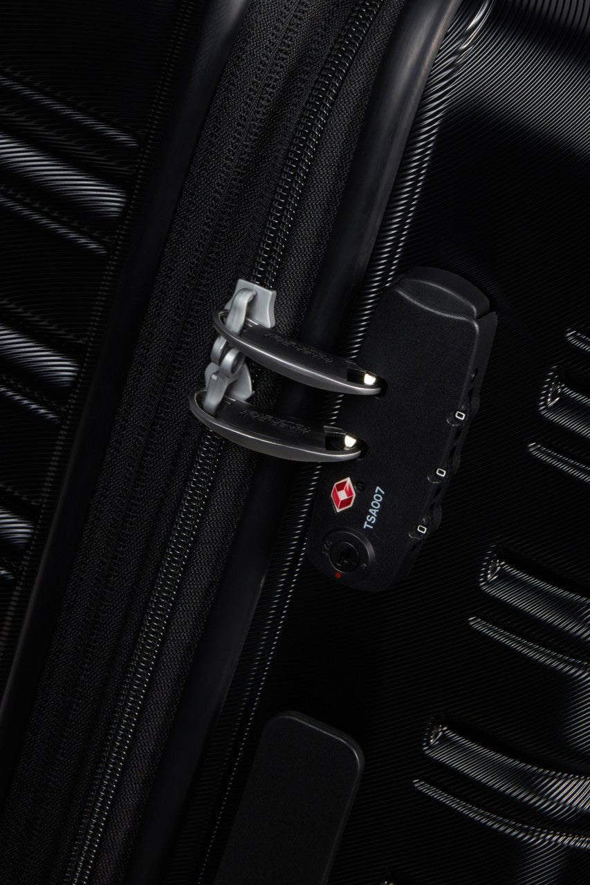 American Tourister Flashline Spinner Expandable 67cm - KaryKase