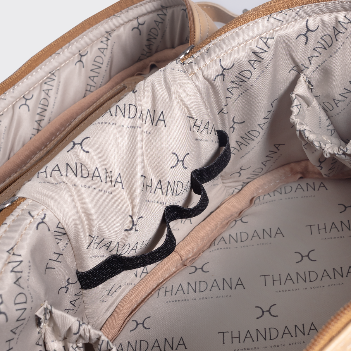 Thandana Laminated Fabric Bougie Vanity Bag | Beige