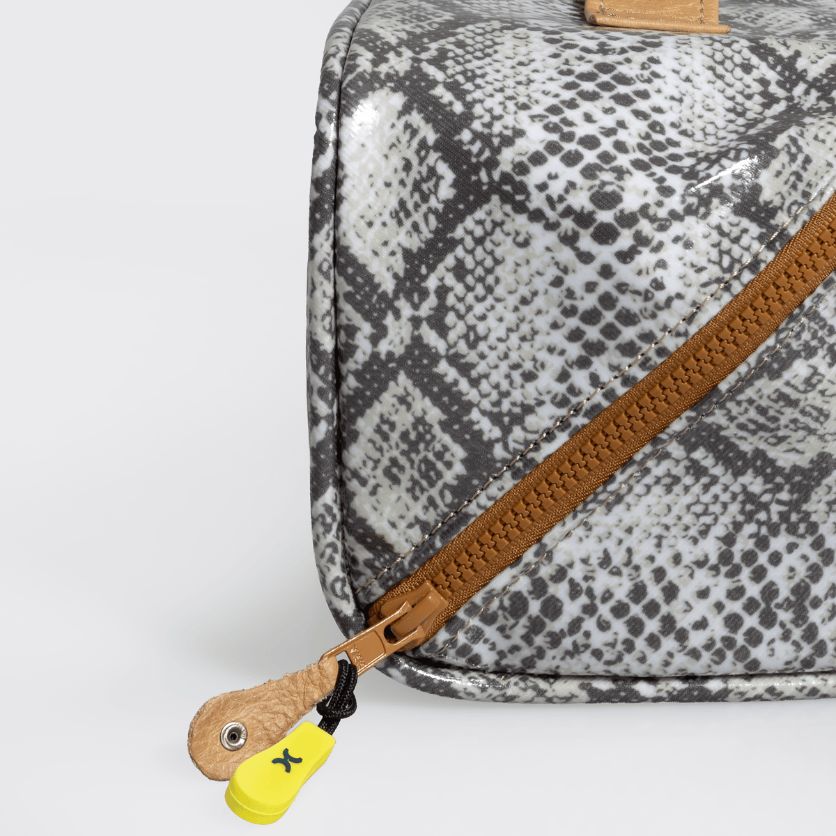 Thandana Laminated Fabric Side Mouth Maxi Vanity Bag - KaryKase